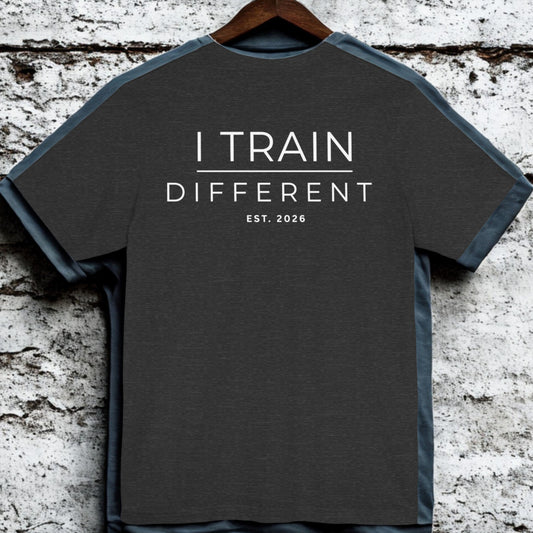 I Train Different Tee — Motivational Fitness T-Shirt (Est. 2026)