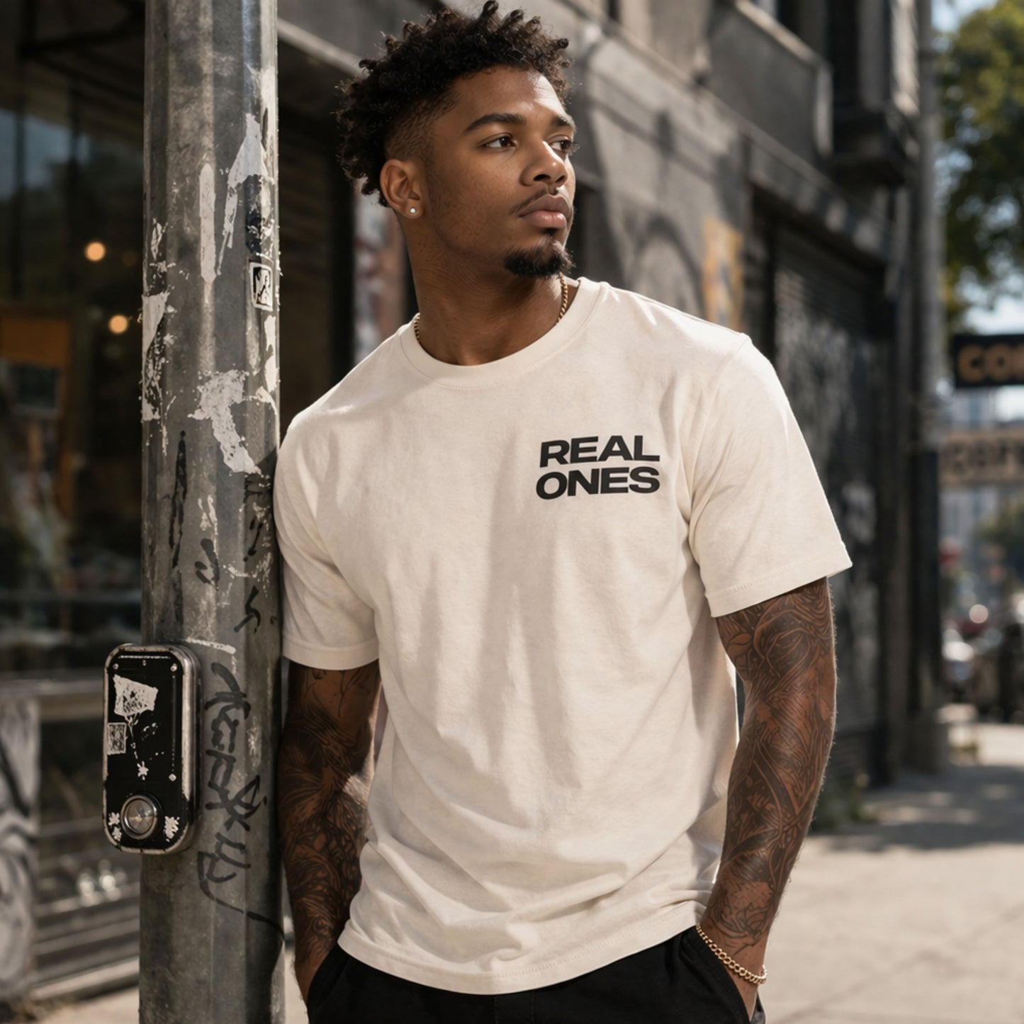 Loyalty Over Everything Tee — "Real Ones" Chest Graphic
